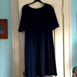 Classic Geoffrey Beene New York navy crepe wool swing dress. Stunning design!